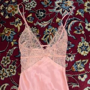 A pink silk dress that can be worn out or can be worn as pajamas too!